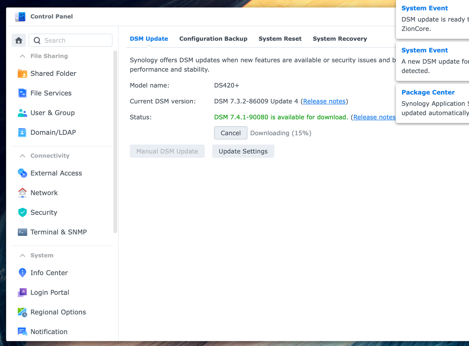 Synology DSM Control Panel showing DSM 7.4.1-90080 downloading on a DS420+.